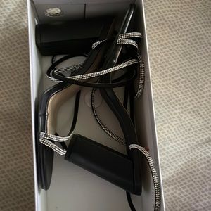 Tie leg designed rhinestone chunky heeled sandals.